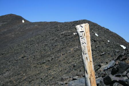 trail marker on rocky path to summit of Mount Humphreys, Arizonaの写真素材