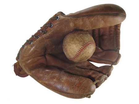 An antique baseball glove (1950's Roy McMillan model) and ball isolated on white backgroundの写真素材
