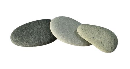 three layered smooth flat gray and light gray pebbles isolated on a white backgroundの写真素材
