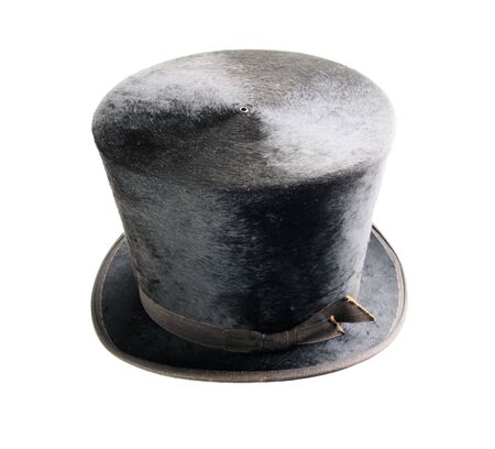 black antique felt top hat isolated on whiteの写真素材
