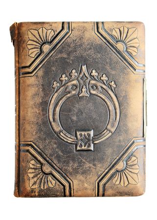 worn antique leather embossed book isolated on whiteの写真素材