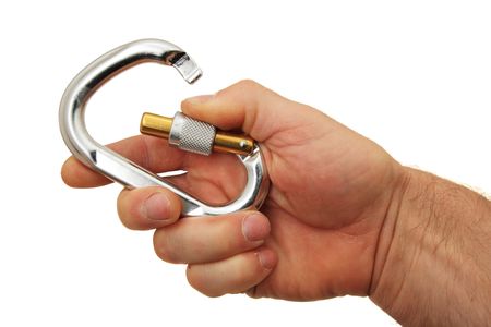 a man's hand holding a locking carabiner open isolated on white