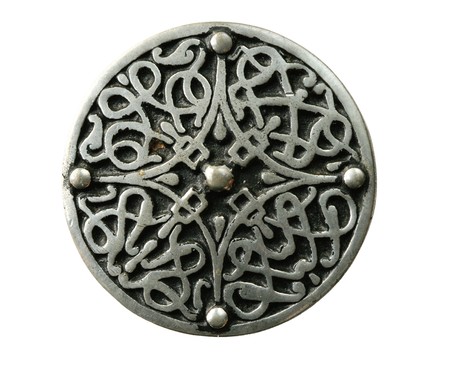 pewter celtic brooch pin isolated on whiteの写真素材