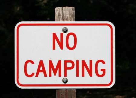 red and white no camping sign with a darker backgroundの写真素材