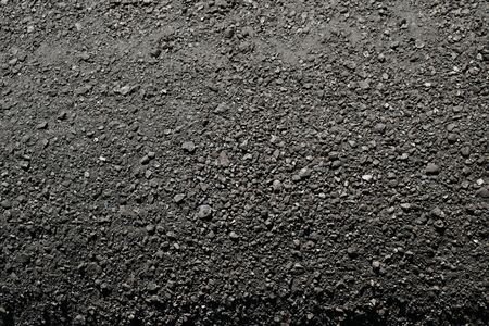 background image of a coal pile taken from aboveの写真素材