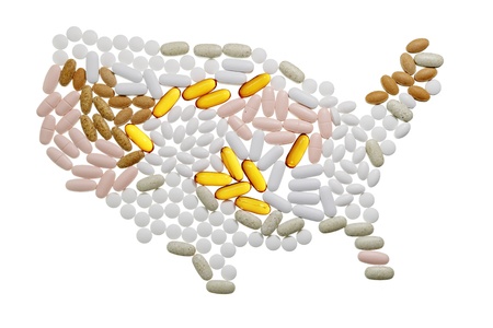 rough map of the USA country made of many pills isolated on whiteの写真素材