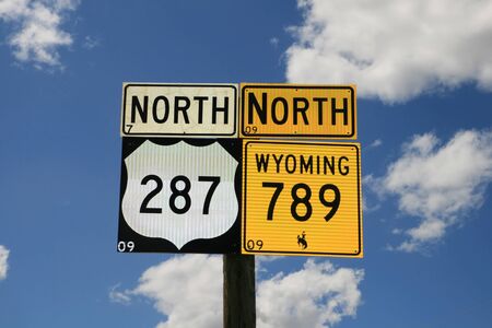 wyoming 789 north and 287 north road signs with sky backgroundの写真素材