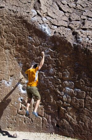 falling rock climber man with motion blurの写真素材