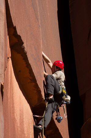 a man crack rock climbing at Indian Creek Utahの写真素材