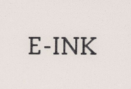 macro of electronic ink or e-ink with E-INK spelled out on it