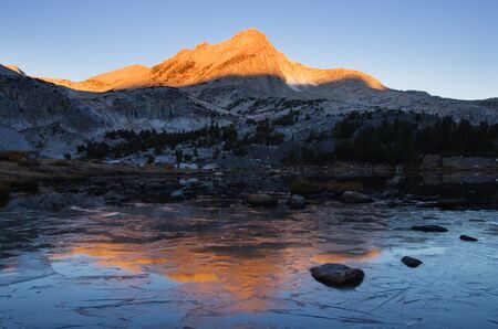 reflection of North Mountain on icy Greenstone Lakeの写真素材