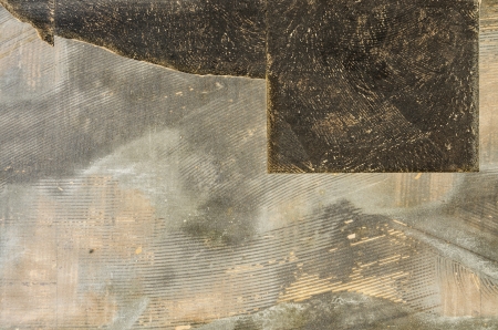 broken old flooring tiles background with old carpet backing glueの写真素材