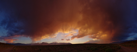 dramatic desert sunset panorama from the volcanic tableland near Bishop Californiaの写真素材