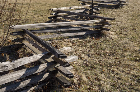 zig zag split rail fence in a fieldの写真素材