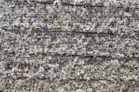 shredded white paper baled up for recyclingの写真素材