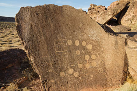petroglyphs carved into volcanic tuff rock on the volcanic tableland near Bishop Californiaの写真素材