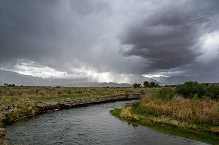 spring storm over the owens river valley and the Sierra Nevada Mountainsの写真素材