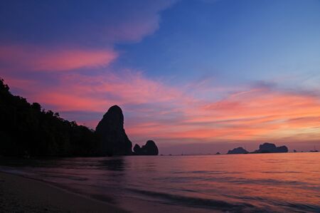 sunset on the tropical beach of Tonsai Thailandの写真素材