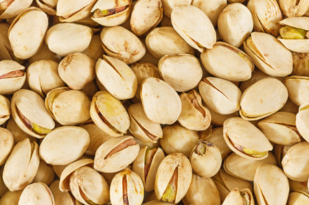 close up image of raw pistachio nutsの写真素材
