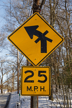 unusual complex intersection sign with 25 mph warningの写真素材