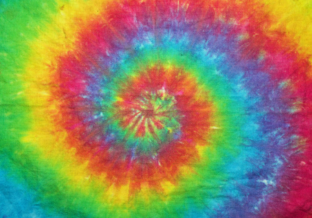cloth tie dyed into a spiral rainbow patternの写真素材