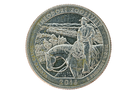 Theodore Roosevelt commemorative quarter coin isolated on whiteの写真素材