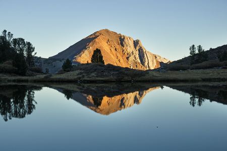Laurel Mountain reflected in a small Sierra Nevada mountain lakeの写真素材