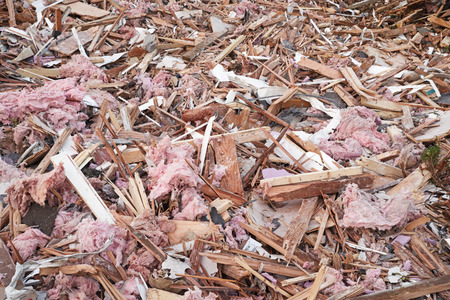 construction debris with insulation wood and metal piecesの写真素材