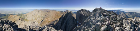 360 degree panorama of the top of Crestone Peak in the Sangre De Cristo Range in Colorado with 2 people on the summitの写真素材