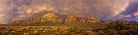 panorama of Red Rock Conservation Area at night lit by the glow from Las Vegasの写真素材