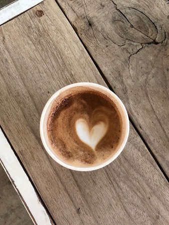 Heart latte art on coffee cup
