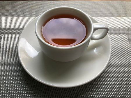 Hot tea cup on tableの写真素材