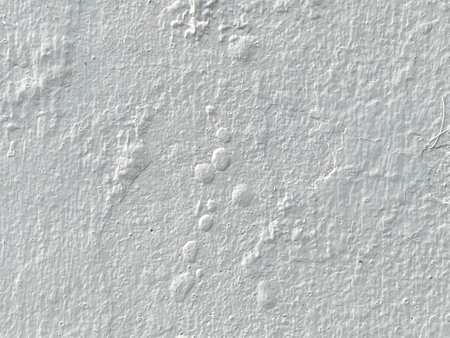 White concrete wall texture. White concrete wall background with cracks and scratches.の写真素材