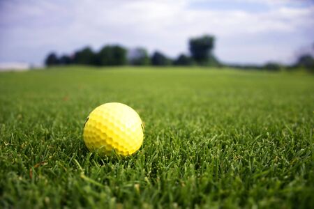 Golf ball on driving rangeの写真素材