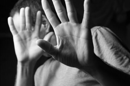 man refusing with hands denied showing that he is not going to do something.not doing or not accepting something offered or request.turn down black and whiteの写真素材