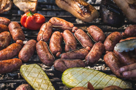 Grilled sausages with vegetables, Argentine grill, south american grilled style.の写真素材