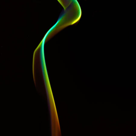 Colorful smoke on black の写真素材
