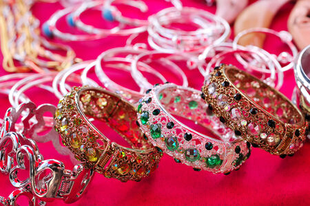 Gold bracelet on textured backgroundの写真素材