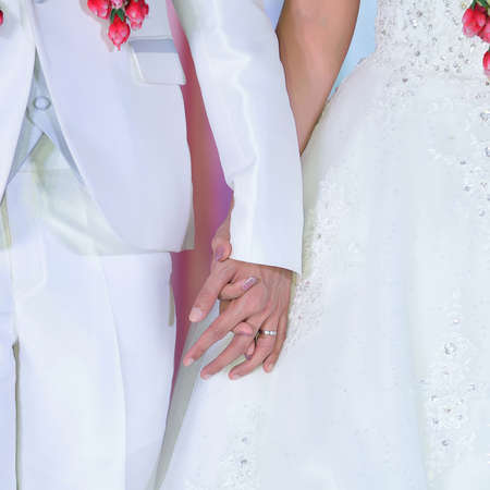 wedding theme, holding hands newlywedsの写真素材