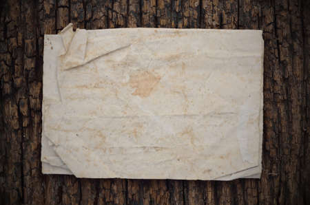 Old paper on the wood backgroundの写真素材