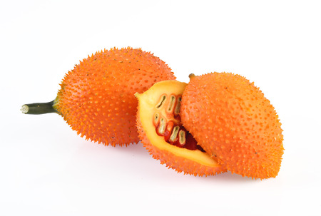 Gac fruit slices isolated on white backgroundの写真素材