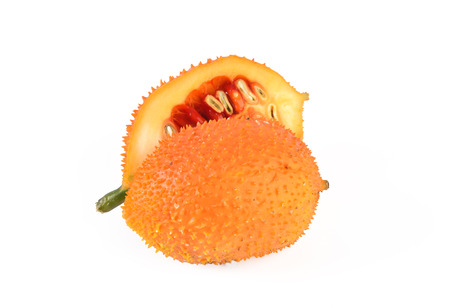 Gac fruit slices isolated on white backgroundの写真素材