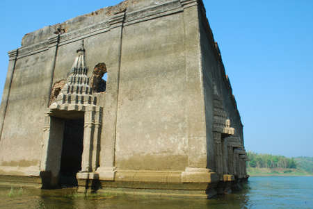 the ruin temple on water, Thailand の写真素材