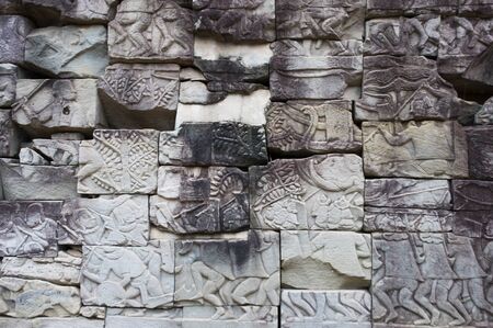 an ancient rilievo in Bayon temple , Cambodiaの写真素材