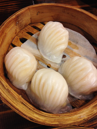 closed up dimsum fill with shrimp in bamboo basketの写真素材