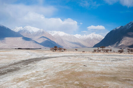 mountain and little desert view in Leh, Indiaの写真素材