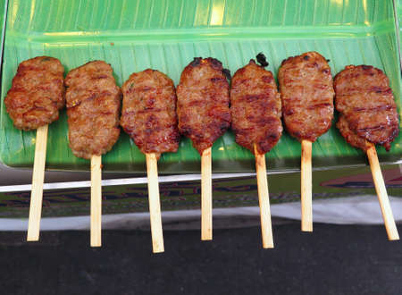 closed up the stick of thai roasted porkの写真素材