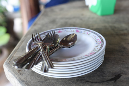 closed up group of spoons, forks and dishes in Thai restaurantの写真素材