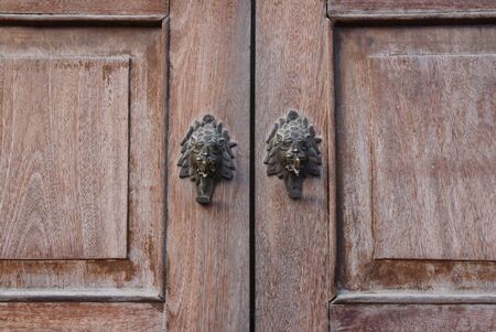 closed up the wood door in Nepalの写真素材