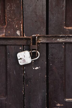 closed up the local master key on wood wall in Nepalの写真素材